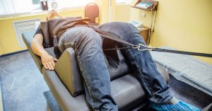 Male-On-Table-At-Total-Chiropractic-Care-And-Wellness-April-2019
